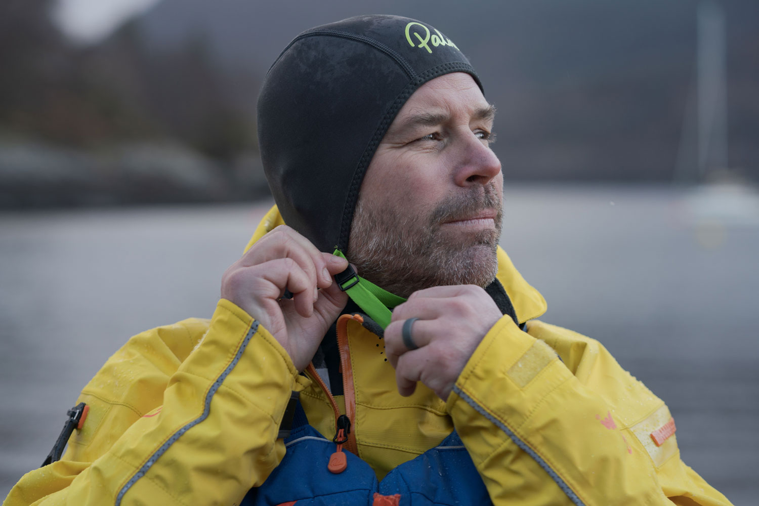 Image of a paddler wearing a warm, thermal head cap