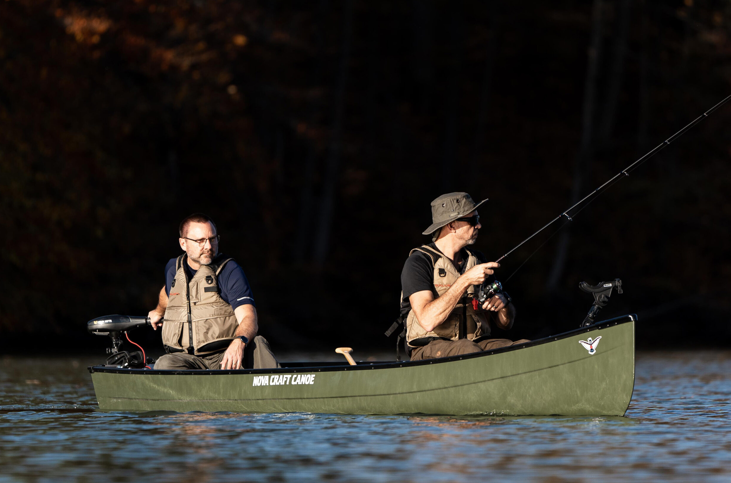 Canoes with a transom outboard motor mount